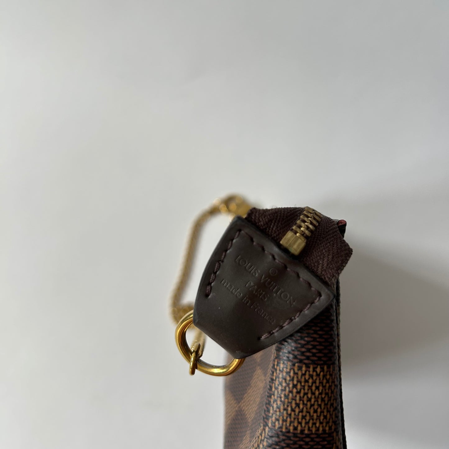 LOUIS VUITTON DAMIER EBENE MINI POCHETTE ACCESSOIRES