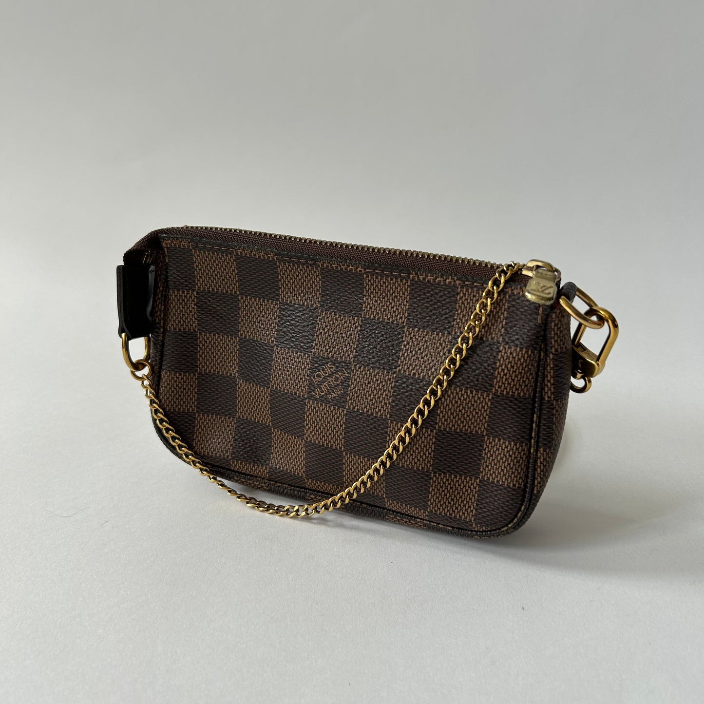 LOUIS VUITTON DAMIER EBENE MINI POCHETTE ACCESSOIRES