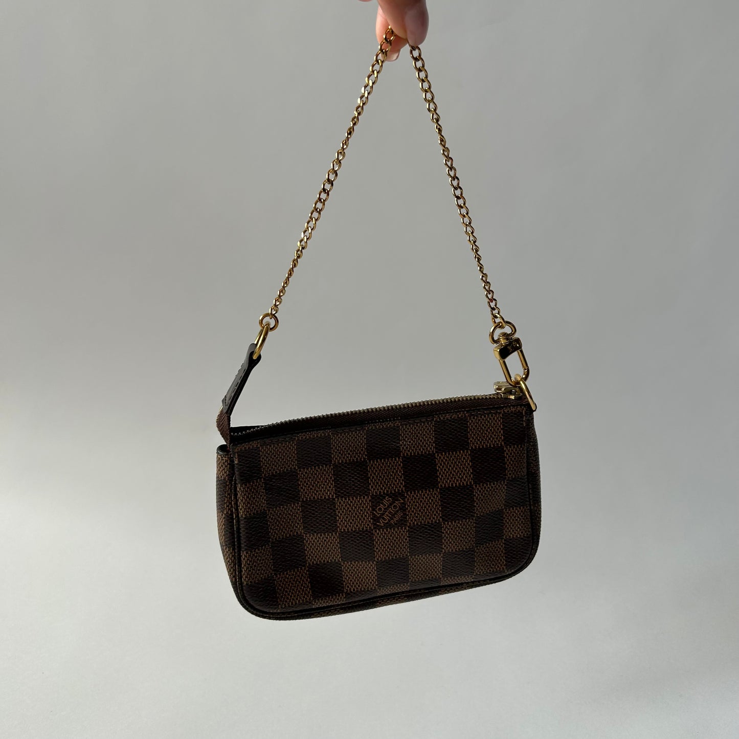 LOUIS VUITTON DAMIER EBENE MINI POCHETTE ACCESSOIRES