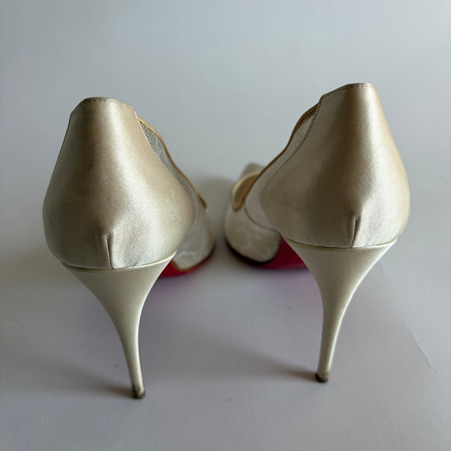CHRISTIAN LOUBOUTIN OFF WHITE SATIN AND LACE FOLLIES PUMPS