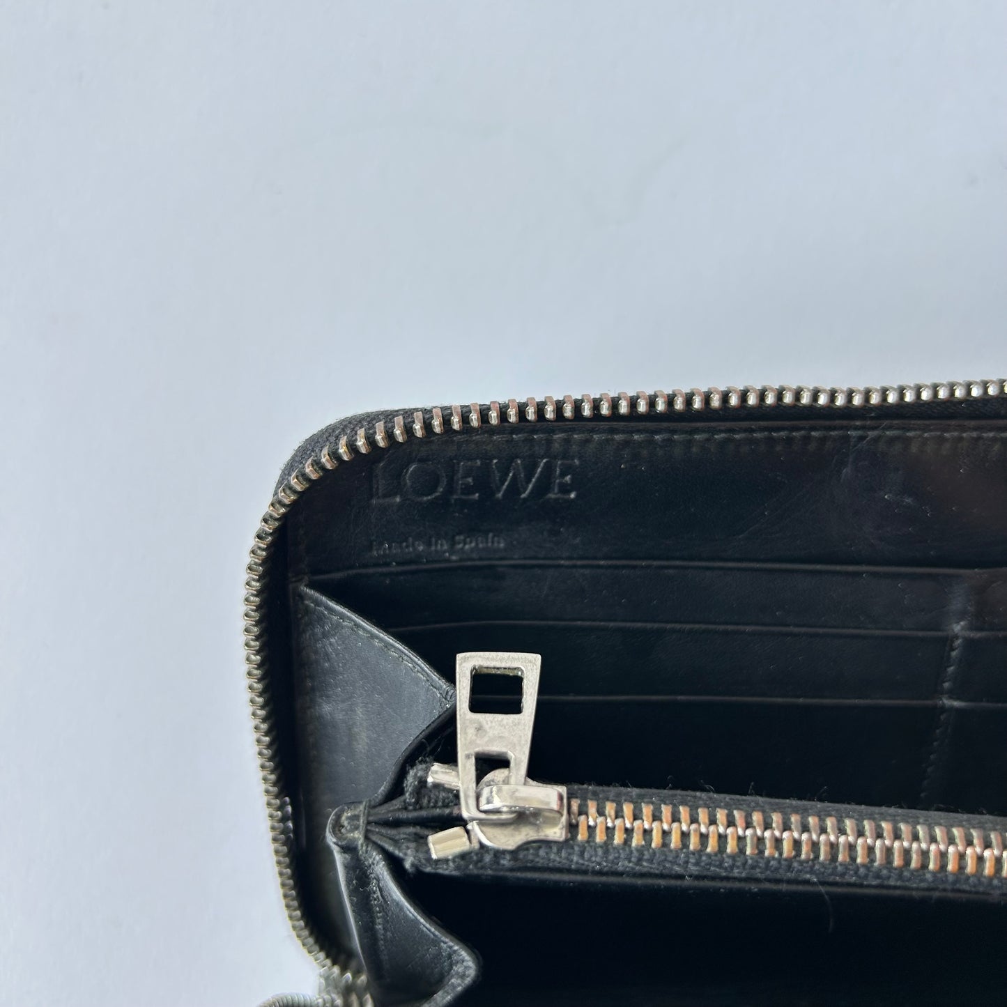 LOEWE REPEAT ZIP AROUND WALLET EMBOSSED CALFSKIN BLACK LEATHER