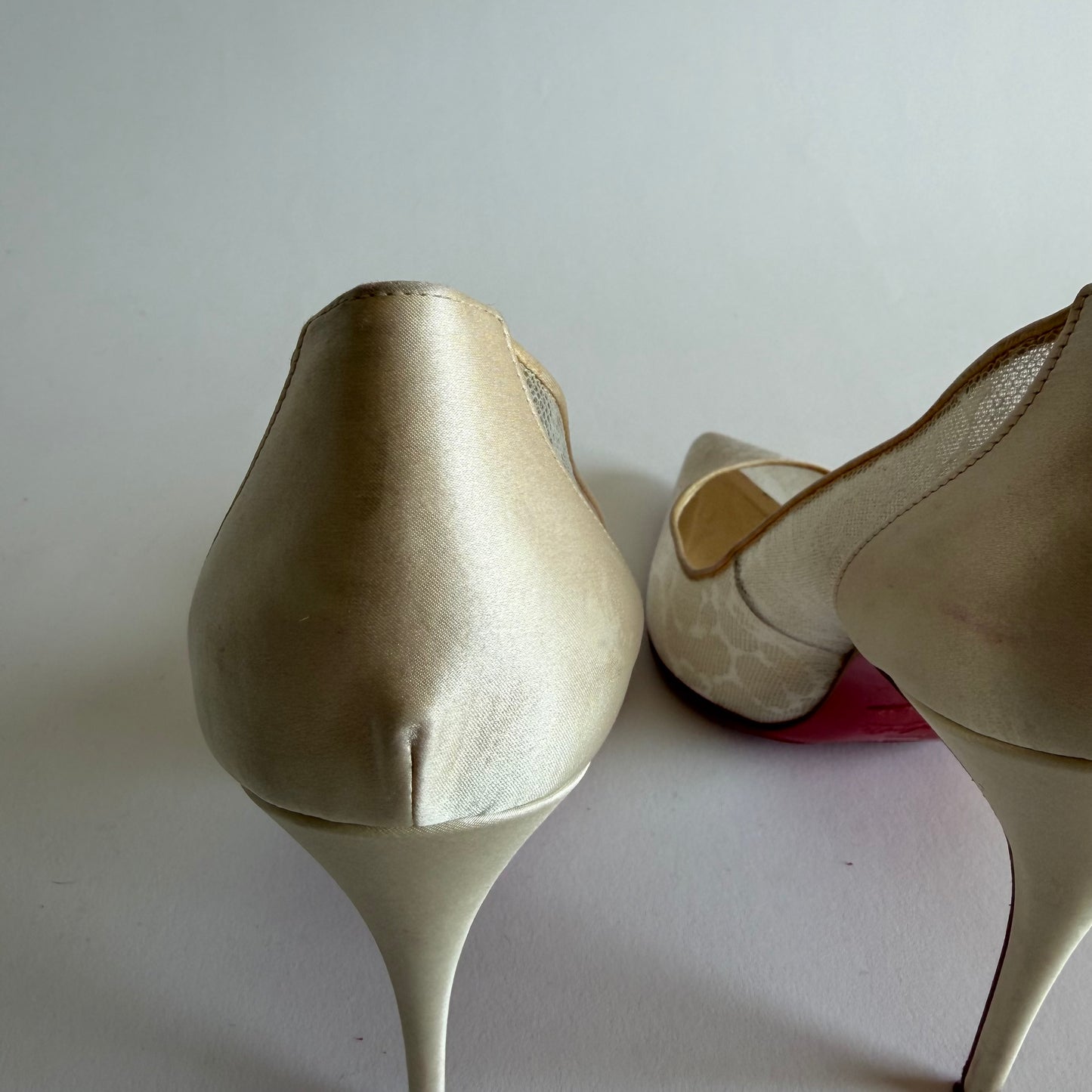 CHRISTIAN LOUBOUTIN OFF WHITE SATIN AND LACE FOLLIES PUMPS