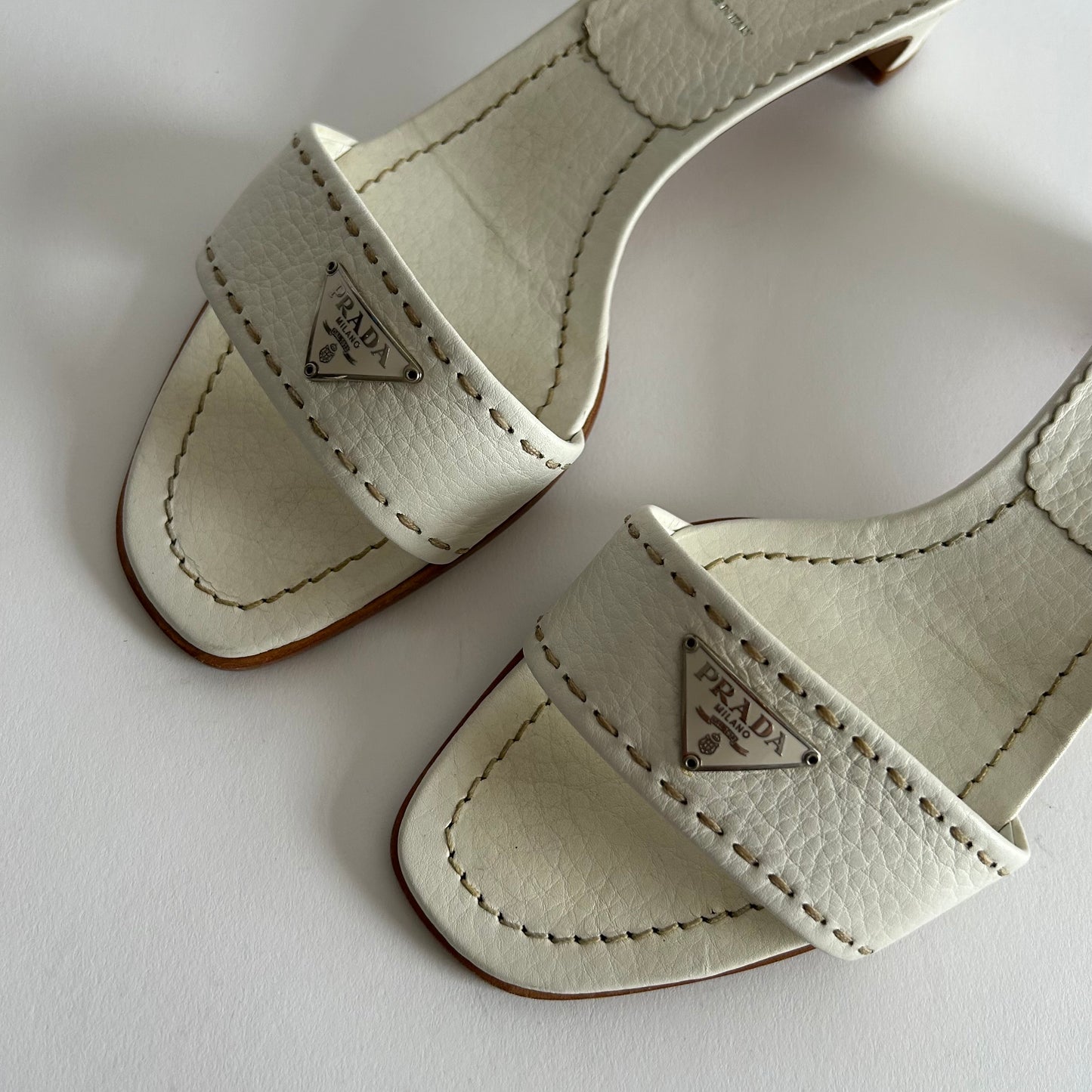 PRADA WHITE LEATHER MULES